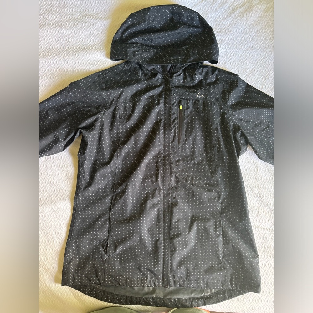 Paradox green dotted hooded raincoat in size M